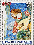 Angelo musicante - (19.5.1998) - Un frammento di Angelo musicante, che costituiva parte di una decorazione absidale, avente per oggetto l'Ascensione di Cristo, conservato presso la Pinacoteca Vaticana. In alto a sinistra il valore; a sinistra la scritta Melozzo da Forl - Angeli Musicanti; in basso, le chiavi decussate sormontate dal triregno e la scritta Citt del Vaticano. Policromo.